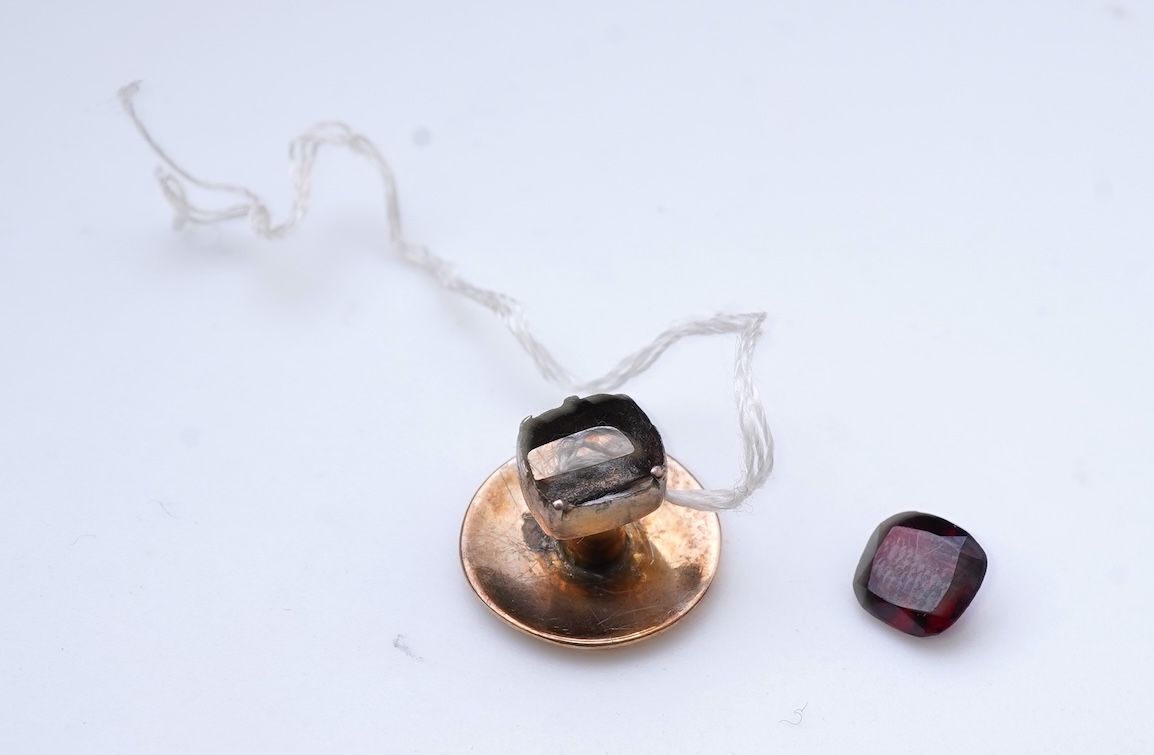 A collection of cufflinks and dress studs
